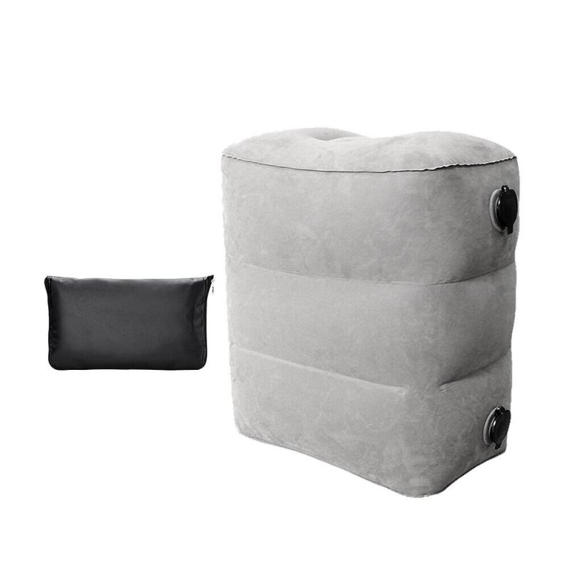 Inflatable foot rest travel air pillow top